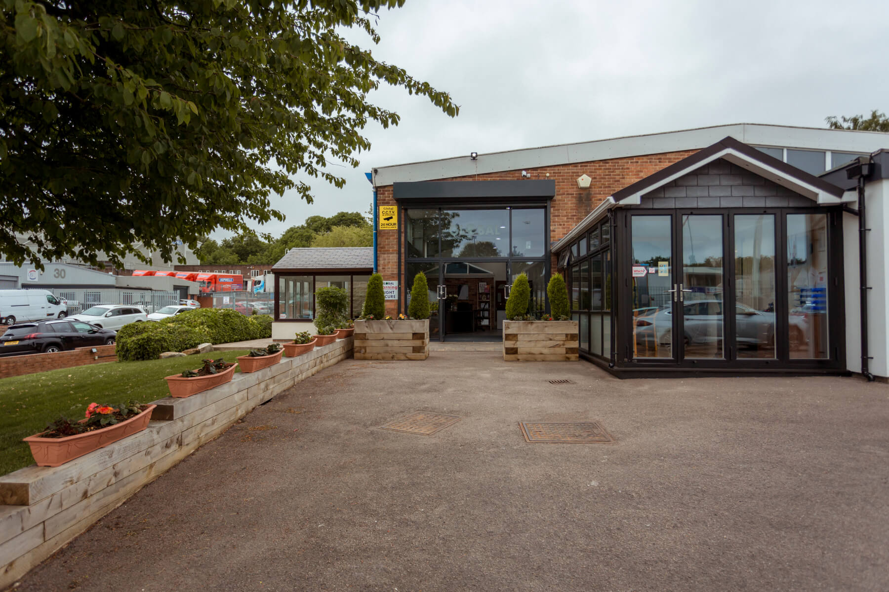 Global entrance , a large black glass sliding door