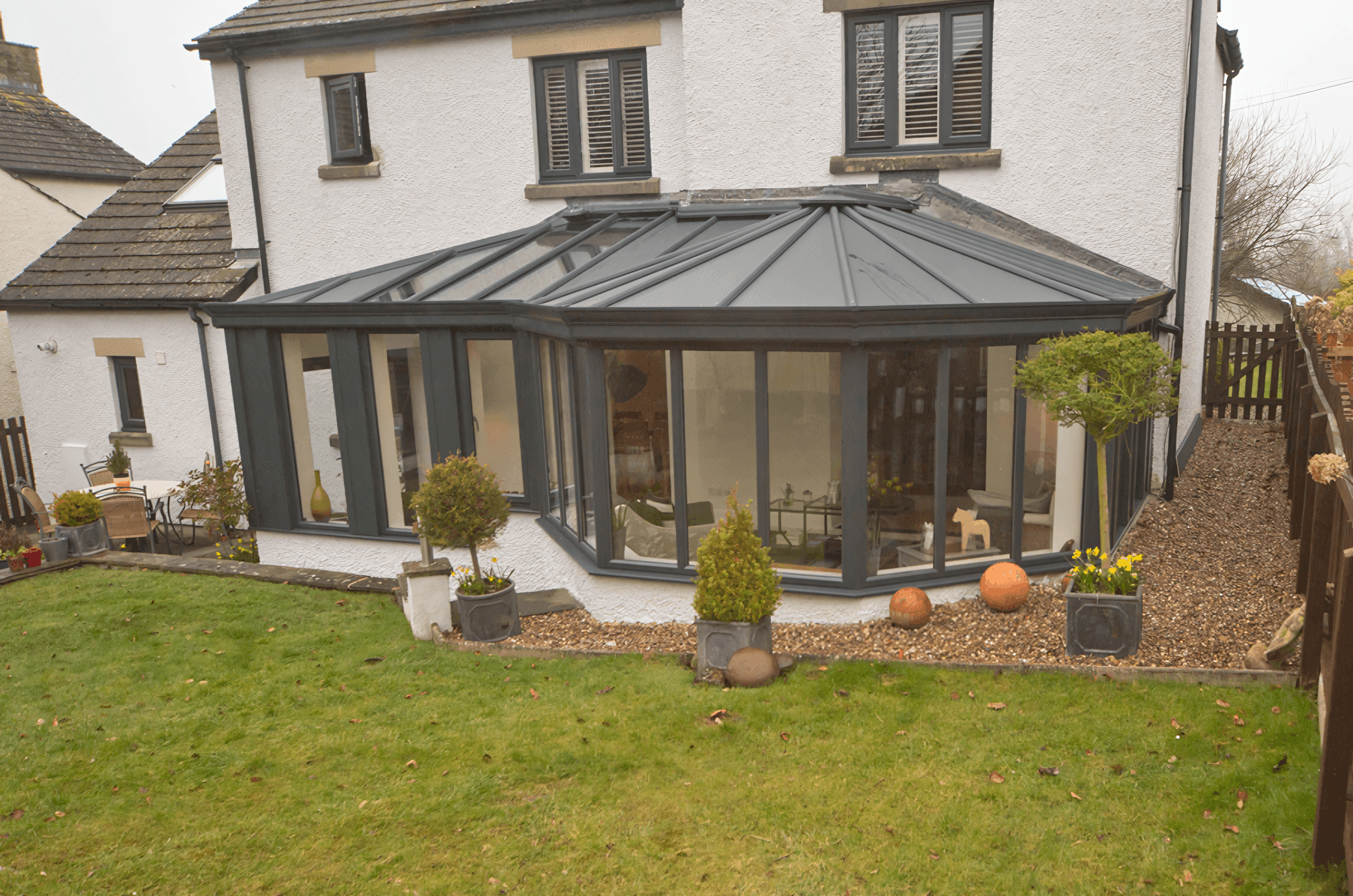 P shape anthracite grey conservatory - Global Windows - conservatories increase property value